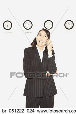 Stock Photo - businesswoman 
in front of clocks 
with different 
time zones,  san. 
fotosearch - search 
stock photos, 
pictures, images, 
and photo clipart