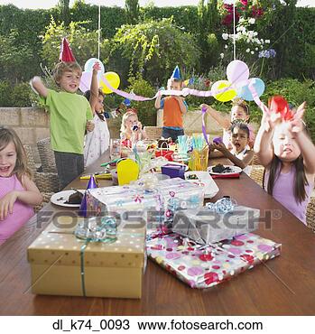 Stock Photo - child's birthday 
party outdoors. 
fotosearch - search 
stock photos, 
pictures, images, 
and photo clipart