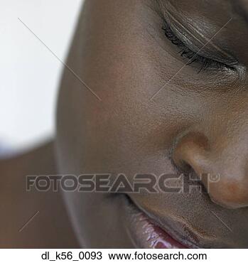 Stock Photo - close up african 
woman's face, 
perth, australia. 
fotosearch - search 
stock photos, 
pictures, images, 
and photo clipart