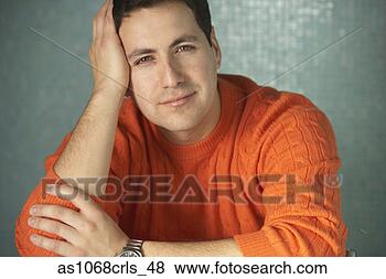 Stock Photo - close up of hispanic 
man leaning his 
head on his hand, 
 richmond. fotosearch 
- search stock 
photos, pictures, 
images, and photo 
clipart