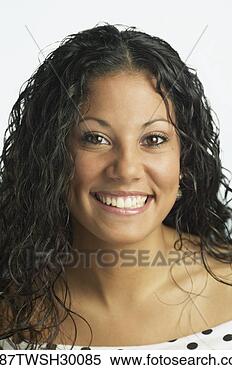Stock Image - close up of young 
hispanic woman 
smiling. fotosearch 
- search stock 
photos, pictures, 
images, and photo 
clipart