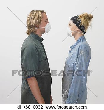 Stock Photo - couple wearing 
dust masks and 
painting clothes. 
fotosearch - search 
stock photos, 
pictures, images, 
and photo clipart