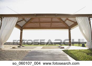 Stock Photo - covered outdoor 
yoga area, los 
cabos, mexico. 
fotosearch - search 
stock photos, 
pictures, images, 
and photo clipart