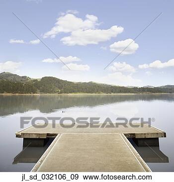 Stock Photograph - empty dock under 
a blue sky, san 
pablo lake. fotosearch 
- search stock 
photos, pictures, 
images, and photo 
clipart