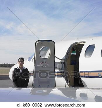 Stock Photo - female flight 
attendant next 
to airplane door, 
perth, australia. 
fotosearch - search 
stock photos, 
pictures, images, 
and photo clipart