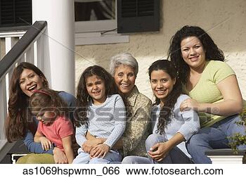 Stock Photo - female hispanic 
family members 
sitting on the 
porch smiling. 
fotosearch - search 
stock photos, 
pictures, images, 
and photo clipart