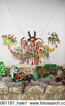 Stock Photography - group of children 
with christmas 
decorations. fotosearch 
- search stock 
photos, pictures, 
images, and photo 
clipart