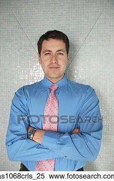 Stock Image - hispanic businessman 
with his arms 
crossed,  richmond, 
 virginia. fotosearch 
- search stock 
photos, pictures, 
images, and photo 
clipart