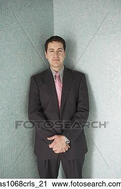 Stock Photography - hispanic businessman 
standing in a 
corner facing 
out,  richmond. 
fotosearch - search 
stock photos, 
pictures, images, 
and photo clipart