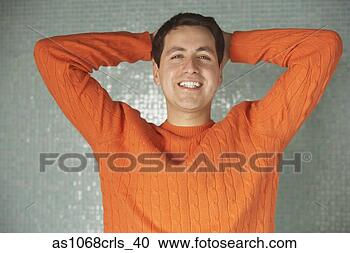 Stock Photography - hispanic man standing 
with his hand 
behind his head, 
 richmond. fotosearch 
- search stock 
photos, pictures, 
images, and photo 
clipart