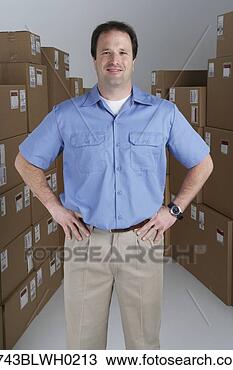 Stock Photo - male warehouse 
worker in warehouse. 
fotosearch - search 
stock photos, 
pictures, images, 
and photo clipart