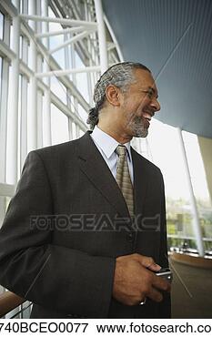 Picture - middle-aged african 
businessman smiling, 
 north bethesda, 
 maryland. fotosearch 
- search stock 
photos, pictures, 
images, and photo 
clipart