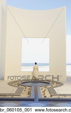 Stock Photography - person in robe 
at beach resort, 
los cabos, mexico. 
fotosearch - search 
stock photos, 
pictures, images, 
and photo clipart