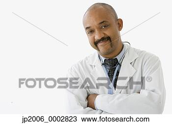 Stock Photo - studio shot of 
a male dominican 
doctor. fotosearch 
- search stock 
photos, pictures, 
images, and photo 
clipart