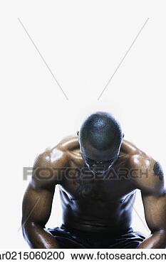 Stock Photography - sweaty african 
man sitting, edmonds, 
washington, united 
states. fotosearch 
- search stock 
photos, pictures, 
images, and photo 
clipart