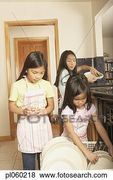 Stock Photo - three young asian 
sisters doing 
the dishes,  san 
rafael,  california. 
fotosearch - search 
stock photos, 
pictures, images, 
and photo clipart