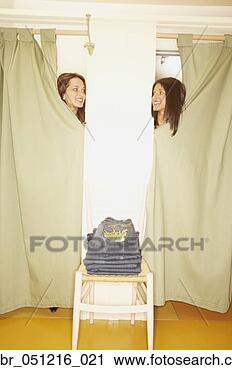 Stock Photography - two women peeking 
out from two fitting 
rooms,  larkspur, 
 california. fotosearch 
- search stock 
photos, pictures, 
images, and photo 
clipart