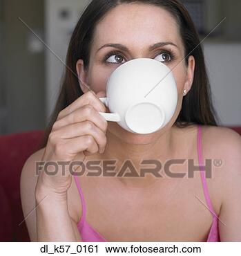 Stock Photography - woman drinking 
from teacup, perth, 
australia. fotosearch 
- search stock 
photos, pictures, 
images, and photo 
clipart
