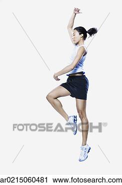 Stock Photography - woman jumping, 
edmonds, washington, 
united states. 
fotosearch - search 
stock photos, 
pictures, images, 
and photo clipart
