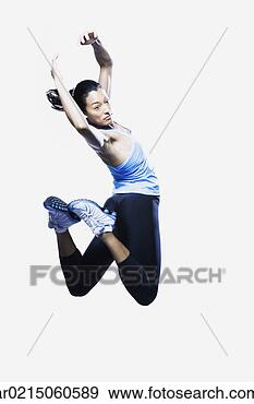 Stock Photograph - woman jumping, 
edmonds, washington, 
united states. 
fotosearch - search 
stock photos, 
pictures, images, 
and photo clipart