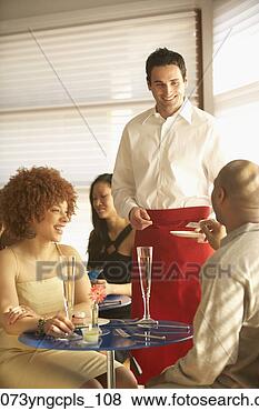 Stock Photo - young african 
couple paying 
bill at restaurant, 
 richmond,  virginia. 
fotosearch - search 
stock photos, 
pictures, images, 
and photo clipart