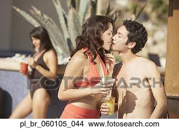 Stock Photo - young hispanic 
couple kissing, 
los cabos, mexico. 
fotosearch - search 
stock photos, 
pictures, images, 
and photo clipart
