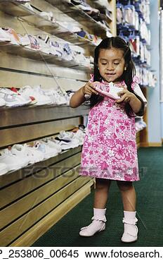 Stock Image - young hispanic 
girl at shoe store, 
 port washington, 
 new york. fotosearch 
- search stock 
photos, pictures, 
images, and photo 
clipart