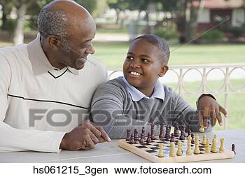 Stock Photo - african american 
boy playing chess 
with grandfather. 
fotosearch - search 
stock photos, 
pictures, images, 
and photo clipart