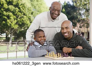 Stock Photo - african american 
family with chessboard 
outdoors. fotosearch 
- search stock 
photos, pictures, 
images, and photo 
clipart