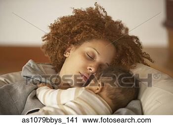 Stock Photography - african american 
mother sleeping 
on sofa with baby. 
fotosearch - search 
stock photos, 
pictures, images, 
and photo clipart