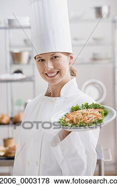 Stock Photo - female chef with 
plate of food. 
fotosearch - search 
stock photos, 
pictures, images, 
and photo clipart