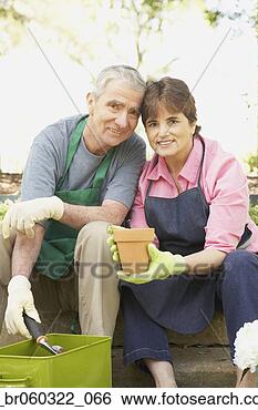 Stock Photo - senior hispanic 
couple gardening. 
fotosearch - search 
stock photos, 
pictures, images, 
and photo clipart