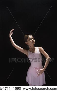Stock Photography - studio shot of 
hispanic girl 
in ballerina outfit. 
fotosearch - search 
stock photos, 
pictures, images, 
and photo clipart