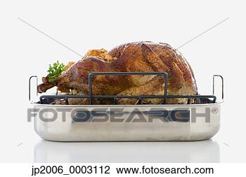 Stock Photo - studio shot of 
roasted turkey 
in pan. fotosearch 
- search stock 
photos, pictures, 
images, and photo 
clipart