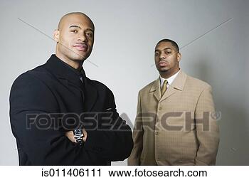 Stock Photography - studio shot of 
two african american 
businessmen. fotosearch 
- search stock 
photos, pictures, 
images, and photo 
clipart