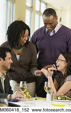 Stock Photo - woman showing 
friends her engagement 
ring. fotosearch 
- search stock 
photos, pictures, 
images, and photo 
clipart
