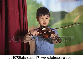 Picture - young asian girl 
playing violin 
at recital. fotosearch 
- search stock 
photos, pictures, 
images, and photo 
clipart