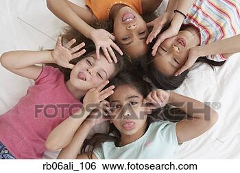 Stock Photo - young girls being 
silly. fotosearch 
- search stock 
photos, pictures, 
images, and photo 
clipart