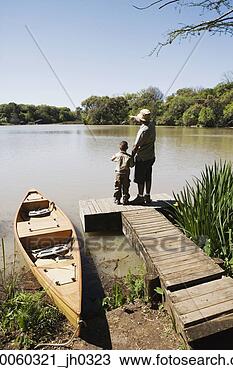 Stock Photo - father and son 
standing on dock. 
fotosearch - search 
stock photos, 
pictures, images, 
and photo clipart