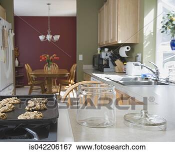 Picture - fresh cookies 
next to empty 
cookie jar. fotosearch 
- search stock 
photos, pictures, 
images, and photo 
clipart