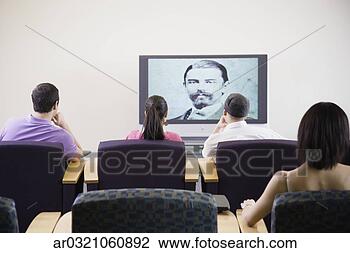 Stock Photo - group of people 
watching television. 
fotosearch - search 
stock photos, 
pictures, images, 
and photo clipart