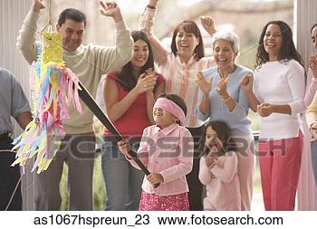 Stock Photo - hispanic girl 
trying to hit 
a pinata,  richmond, 
 virginia,  united. 
fotosearch - search 
stock photos, 
pictures, images, 
and photo clipart