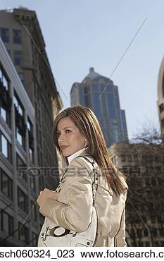 Stock Photo - hispanic woman 
in urban scene. 
fotosearch - search 
stock photos, 
pictures, images, 
and photo clipart
