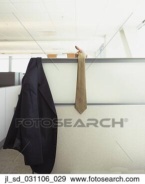 Stock Photograph - suit jacket and 
tie hanging over 
cubicle wall. 
fotosearch - search 
stock photos, 
pictures, images, 
and photo clipart