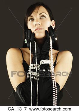Picture - woman wearing 
gloves and pearls. 
fotosearch - search 
stock photos, 
pictures, images, 
and photo clipart