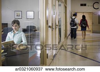 Picture - young female student 
reading in chair. 
fotosearch - search 
stock photos, 
pictures, images, 
and photo clipart