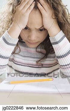 Stock Photo - young girl thinking 
about homework. 
fotosearch - search 
stock photos, 
pictures, images, 
and photo clipart