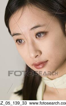 Stock Photo - close up studio 
shot of asian 
woman. fotosearch 
- search stock 
photos, pictures, 
images, and photo 
clipart