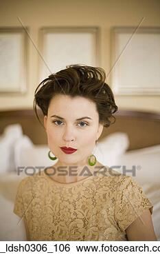 Stock Photo - close up of woman 
with hair up wearing 
red lipstick. 
fotosearch - search 
stock photos, 
pictures, images, 
and photo clipart