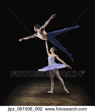 Stock Photo - female ballet 
dancer holding 
up male ballet 
dancer. fotosearch 
- search stock 
photos, pictures, 
images, and photo 
clipart